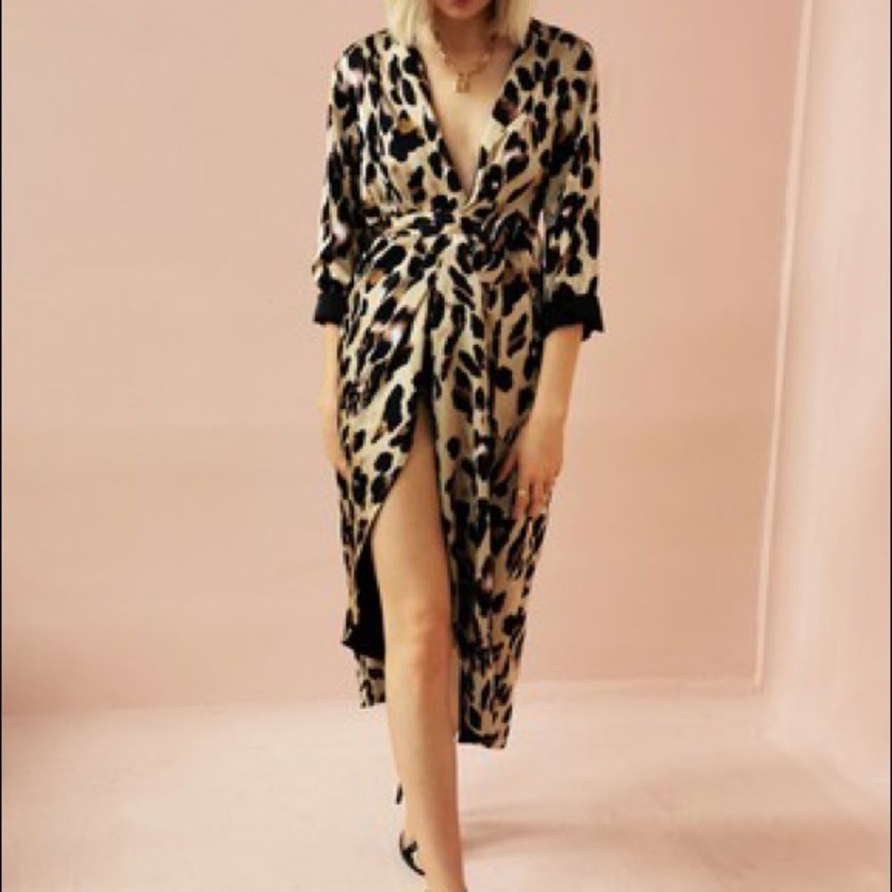 Never Fully Dressed leopard/black reversible wrap dress.